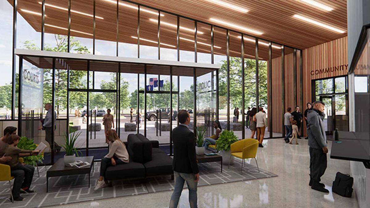Designers hope that wood elements in the glass lobby area will make the Lenexa Justice Center more welcoming to the public.
