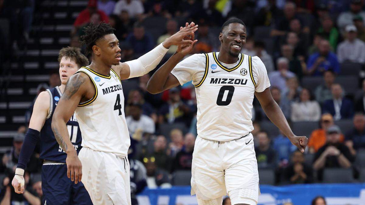 Missouri Tigers guard DeAndre Gholston (4) and forward Mohamed Diarra (0) react against the Utah State Aggies during the first half at Golden 1 Center on March 16, 2023.
