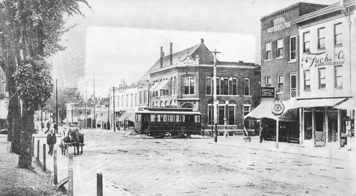 A streetcar rolled through Independence, Missouri, along Maple Avenue at Liberty Street near the start of the 20th century.