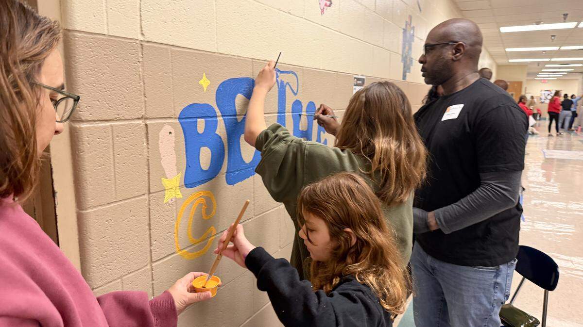 At Primitivo Garcia Elementary School, 31 inspirational murals were painted on Monday.