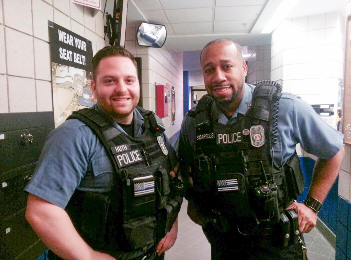 Kevin Sorrells, right, is pictured in a photo from his time as a Kansas City police officer. He said he left the department after facing discrimination and now works as a supervisor at the Ford auto plant in Claycomo.