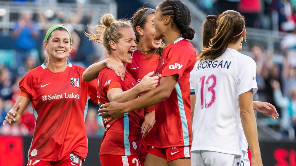 KC Current Forward Kristen Hamilton (center) celebrates the opening goal with her teammates during a June match against the San Diego Wave at Children’s Mercy Park in Kansas City, Kansas