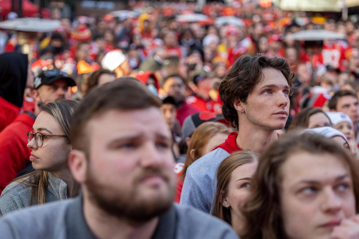 Kansas City Chief fans anxiously watch the AFC Championship game against the Cincinnati Bengals at a watch party at Power and Light District in Kansas City on Sunday, Jan. 30, 2022.