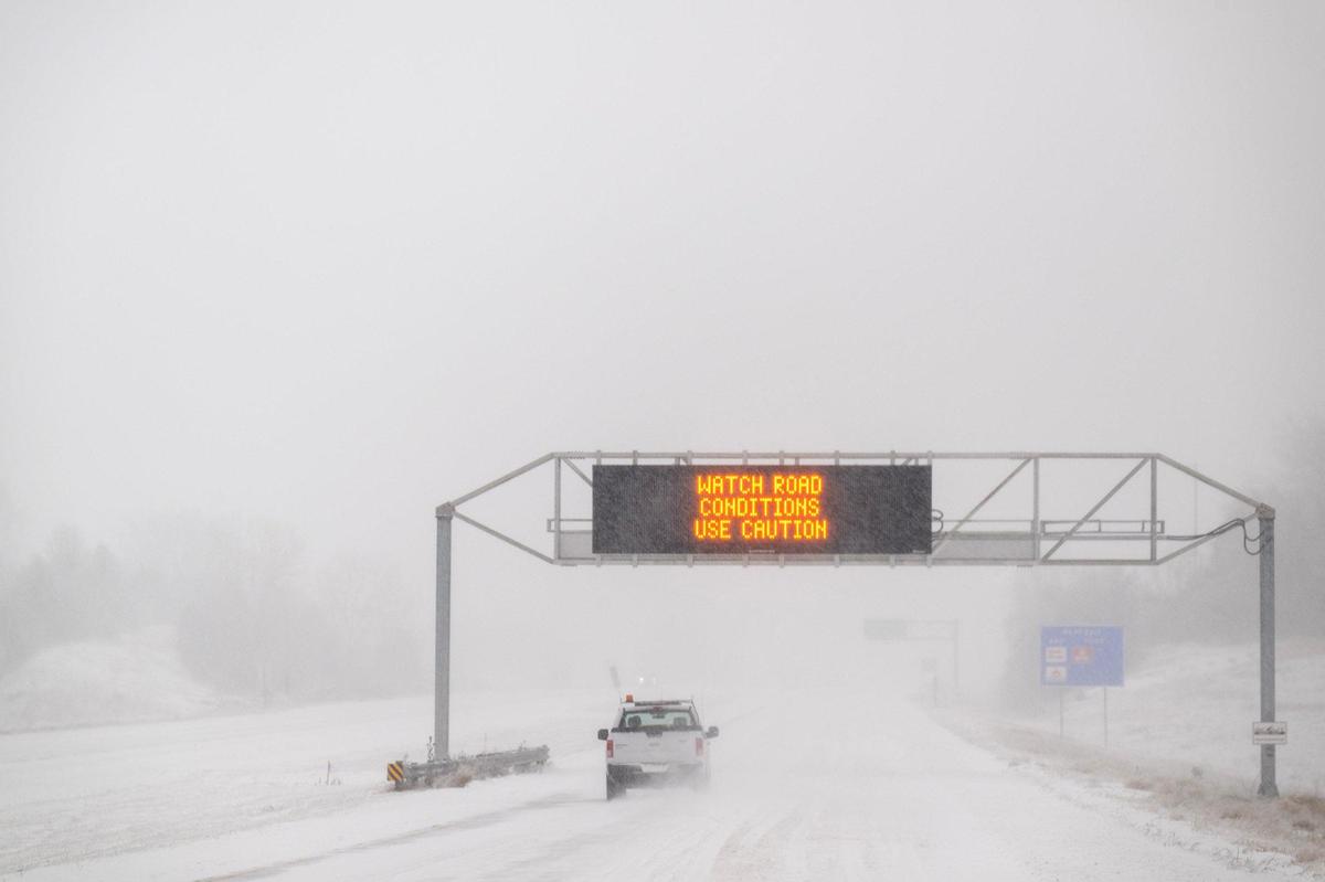 Snow-packed roads and blizzard conditions were slowing drivers who headed west on Kansas 10 Highway on Sunday, Jan. 5, 2025, in Johnson County.