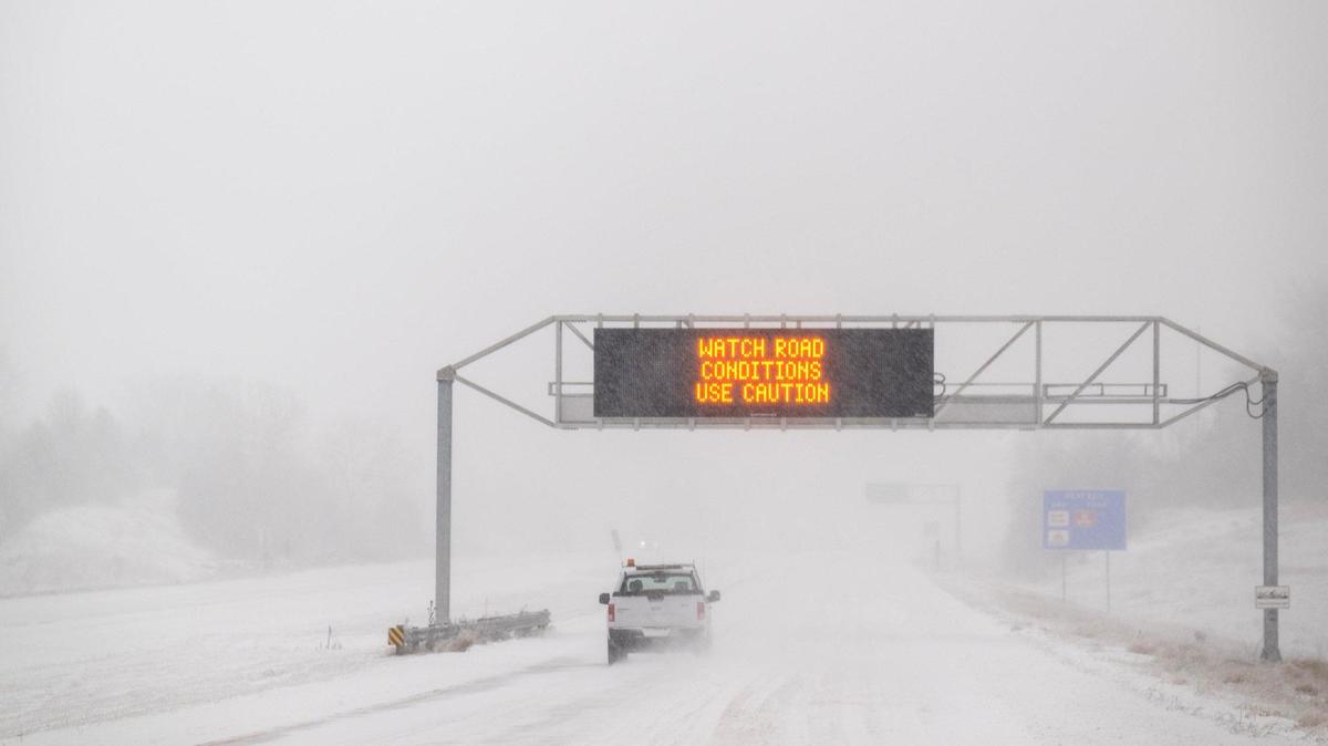 Snow-packed roads and blizzard conditions were slowing drivers who headed west on Kansas 10 Highway on Sunday, Jan. 5, 2025, in Johnson County.