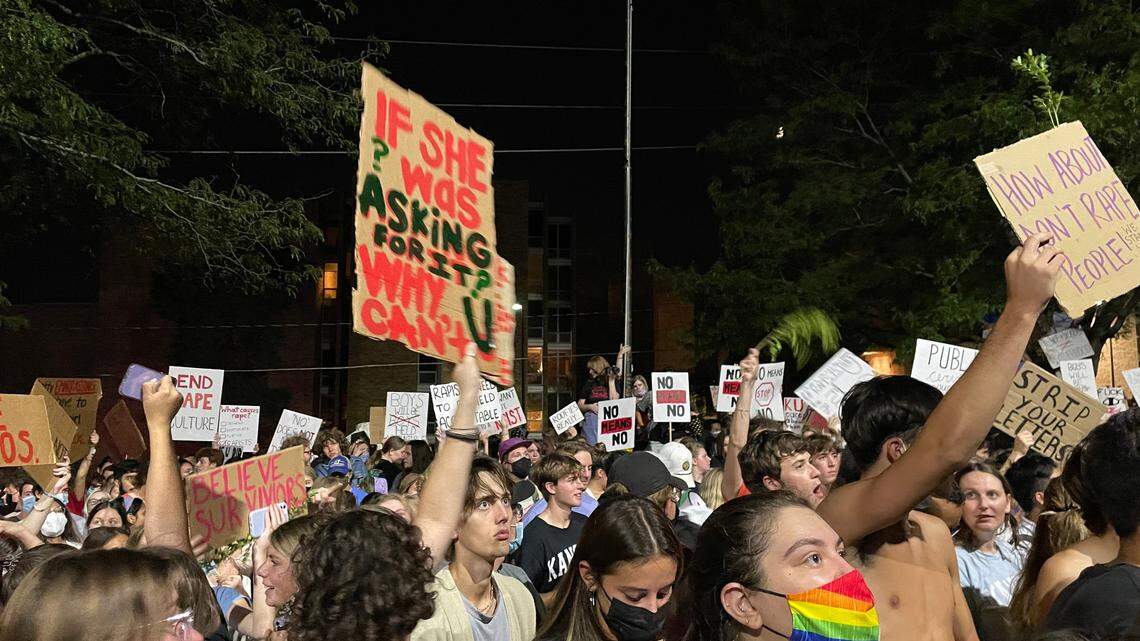 ‘We believe her’: Protesters gather outside KU frat house after alleged rape