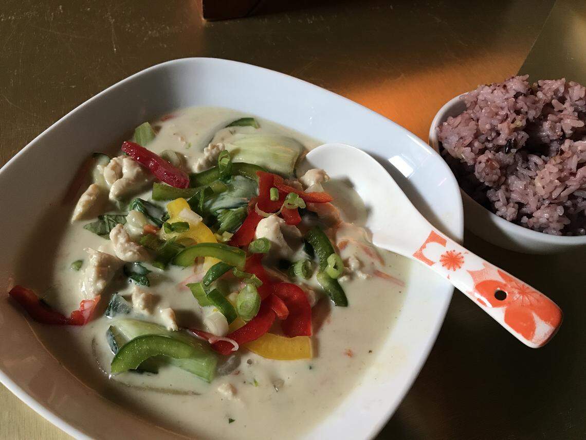 Kobi-Q’s green curry is coconut-based with a choice of chicken or tofu and vegetables, along with a side of rice.