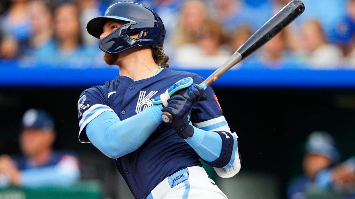 Kansas City Royals shortstop Bobby Witt Jr. hits a home run during the first inning against the Detroit Tigers at Kauffman Stadium.