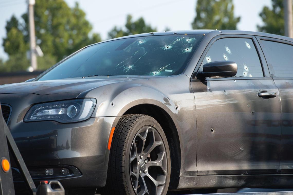 The bullet-riddled car where a child was fatally shot killed and two adults were wounded, was towed Monday, Sept. 21, 2020, from Kansas City Fire Station 18, near 32nd Street and Indiana Avenue in Kansas City. Police believe the shooting took place near a residence in the 2900 block of East 33rd Street. The driver drove to the fire station at Linwood and Indiana and asked firefighters for help.