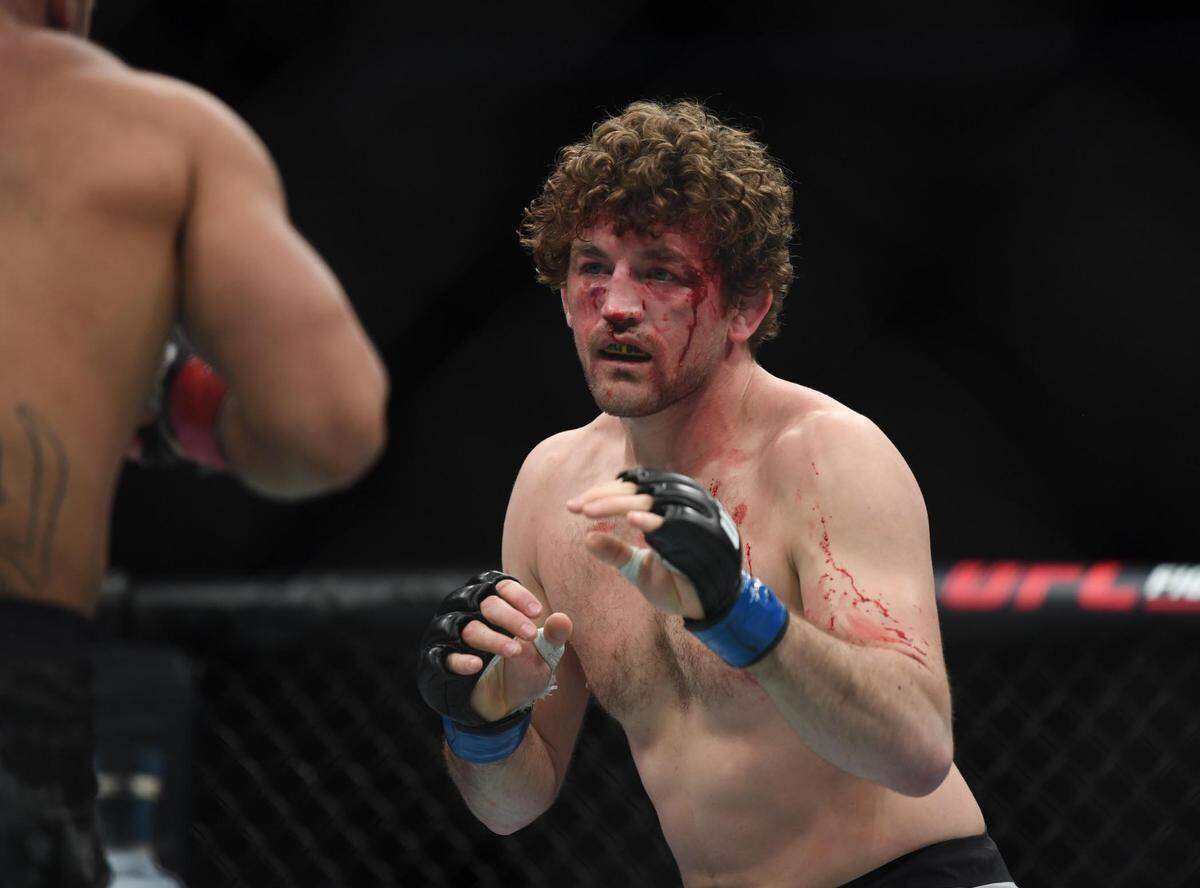Former Mizzou wrestler Ben Askren, right, got into MMA fighting after his wrestling career was done. Here, he takes on Robbie Lawler during a March 2, 2019 bout in Las Vegas.