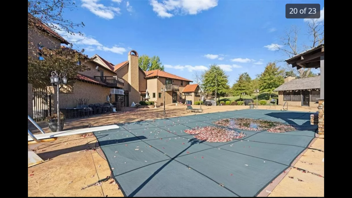 The outdoor pool, covered for the weather, at the house at 5401 Phelps Road in Kansas City.