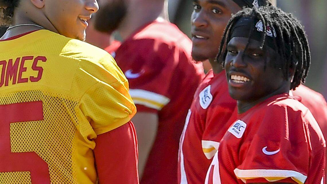 By all accounts, Tyreek Hill, right, has been a model citizen since joining the Chiefs.