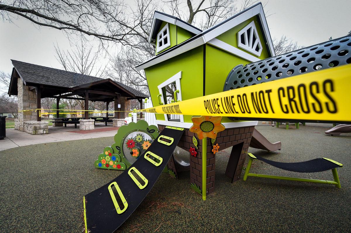 In the wake of the COVID-19 pandemic a stay at home order was in effect on Tuesday. The playground equipment at Neale Peterson Park in Fairway was wrapped in police tape and warning signs dotted the park telling people not to use the playground.