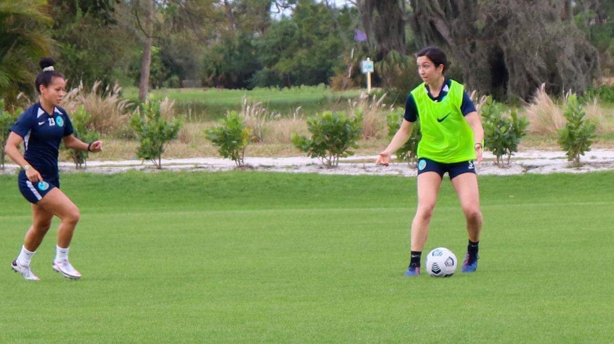Sydney Miramontez, right, is with her new Kansas City NWSL teammates for training this week in Orlando, Fla.