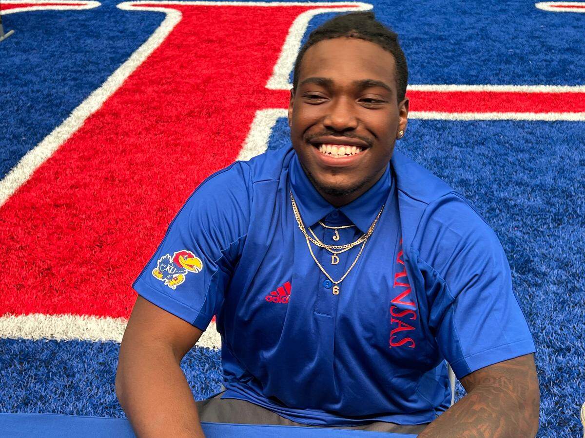 KU junior quarterback Jalon Daniels speaks with reporters at KU football’s Media Day.