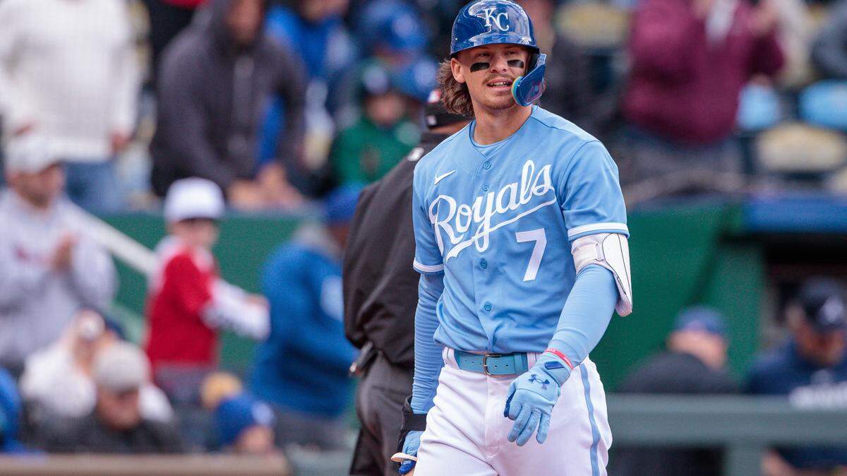 Kansas City Royals shortstop Bobby Witt Jr. (7) walks off the field after striking out during the ninth inning against the Atlanta Braves at Kauffman Stadium.