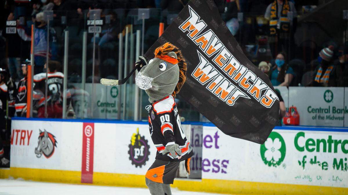 The Kansas City Mavericks’ mascot skates with a special flag Saturday night at Cable Dahmer Arena in Independence.