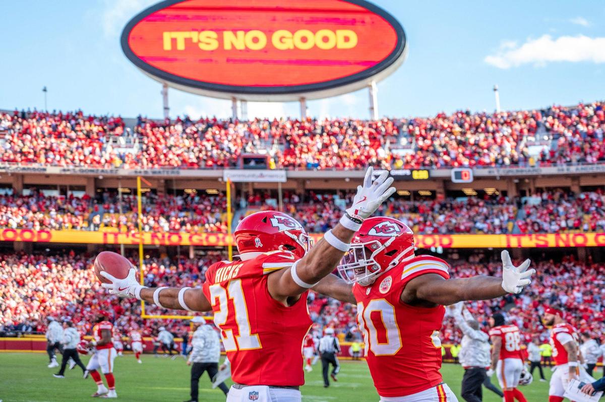 Kansas City Chiefs safety Jaden Hicks (21) embraces cornerback Christian Roland-Wallace (30) after the Chiefs’ 16-14 victory over the Denver Broncos during an NFL game on Sunday, Nov. 10, 2024, at GEHA Field at Arrowhead Stadium.