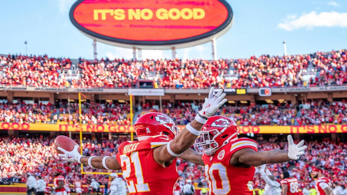 Kansas City Chiefs safety Jaden Hicks (21) embraces cornerback Christian Roland-Wallace (30) after the Chiefs’ 16-14 victory over the Denver Broncos during an NFL game on Sunday, Nov. 10, at GEHA Field at Arrowhead Stadium.