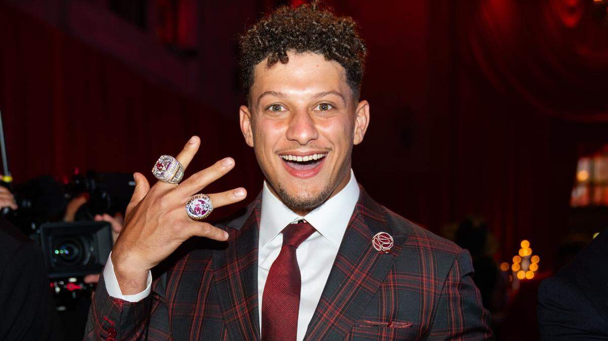 Chiefs quarterback Patrick Mahomes shows off his rings. Led by the superstar signal-caller, the team earned another Super Bowl championship in February.