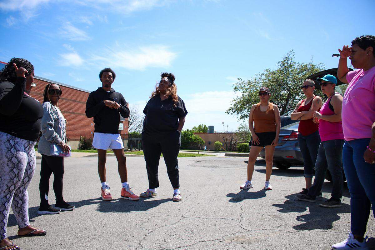 A group of around a dozen people showed up to the area on Troost Avenue where missing person T’Montez Hurt was last seen to search for him and spread awareness April 13, 2024.