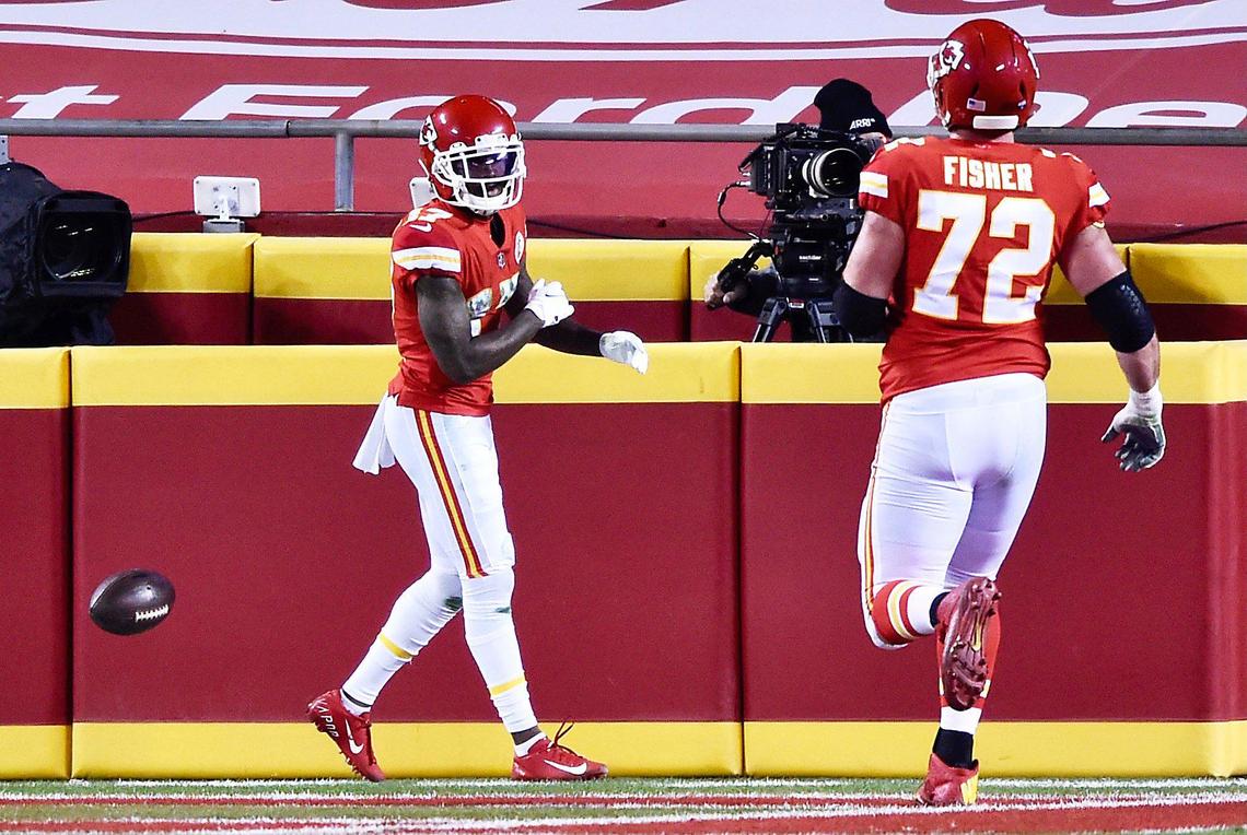 Kansas City Chiefs wide receiver Mecole Hardman drops the ball after running in a touchdown reception early in the second quarter Sunday, January 24, 2021, during the AFC Championship Game at Arrowhead Stadium in Kansas City, Missouri.
