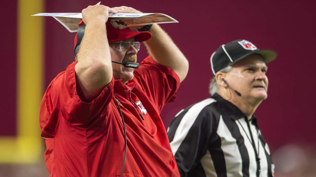 Kansas City Chiefs head coach Andy Reid couldn't believe Kansas City Chiefs outside linebacker Tamba Hali was flagged for a personal foul penalty in the first quarter on a tackle on Arizona Cardinals quarterback Drew Stanton (5) in NFL action on December 7, 2014 at University of Phoenix Stadium in Glendale, AZ.