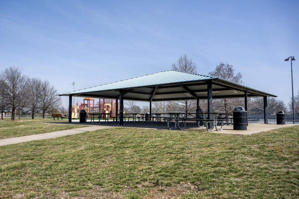 A picnic canopy sits next to a playground at Two Trails Park on Friday, March 20, 2026, in Olathe.