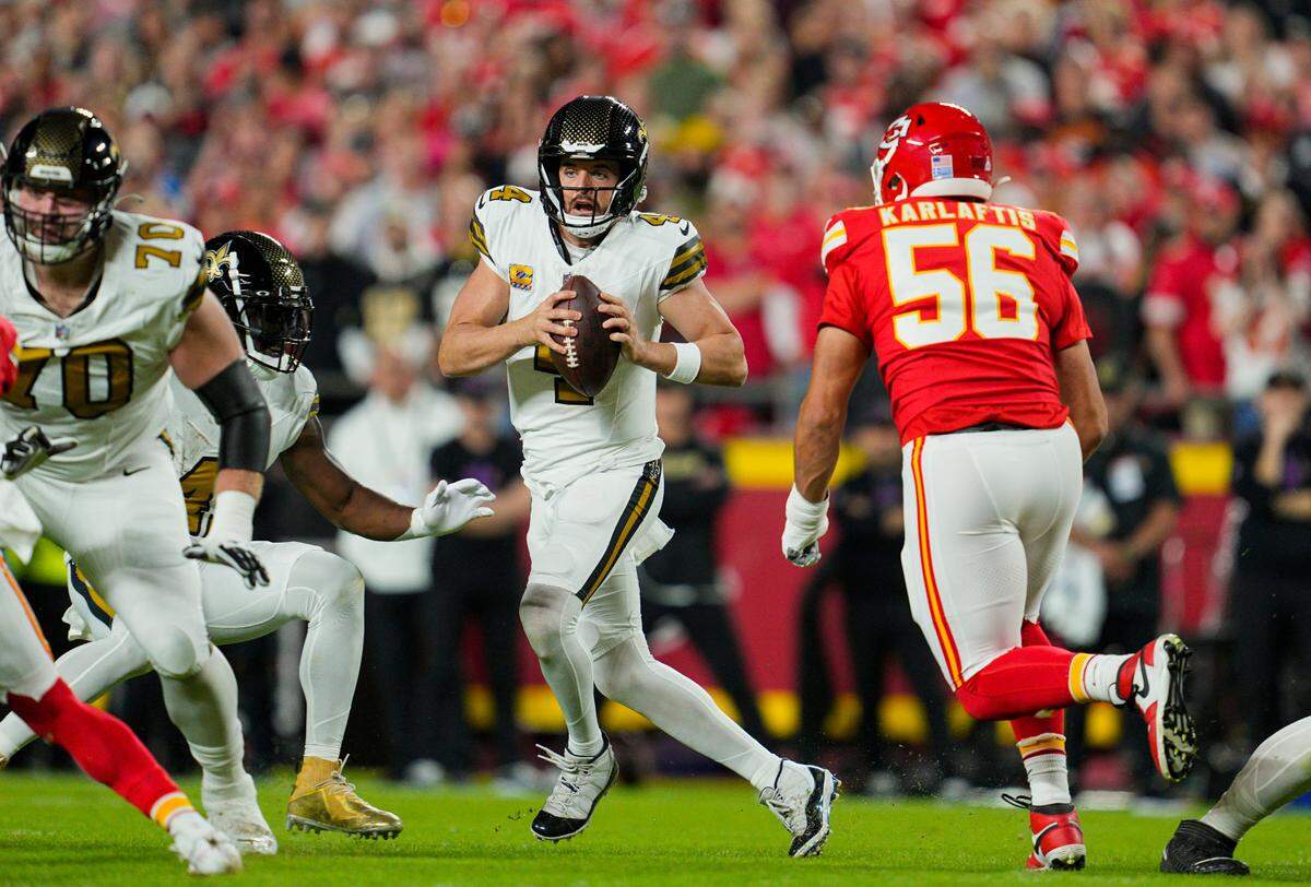 Kansas City Chiefs defensive end George Karlaftis pressures New Orleans Saints quarterback Derek Carr during Monday night’s game at GEHA Field at Arrowhead Stadium.