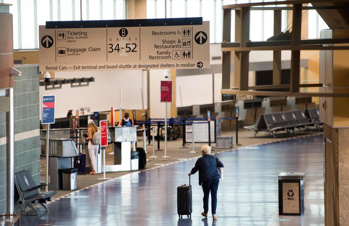 Travelers were sparse near the Delta Airlines check-in counter on Wednesday, Aug. 5, 2020, at Kansas City International Airport. The airport has seen a drop in travelers since the pandemic began.