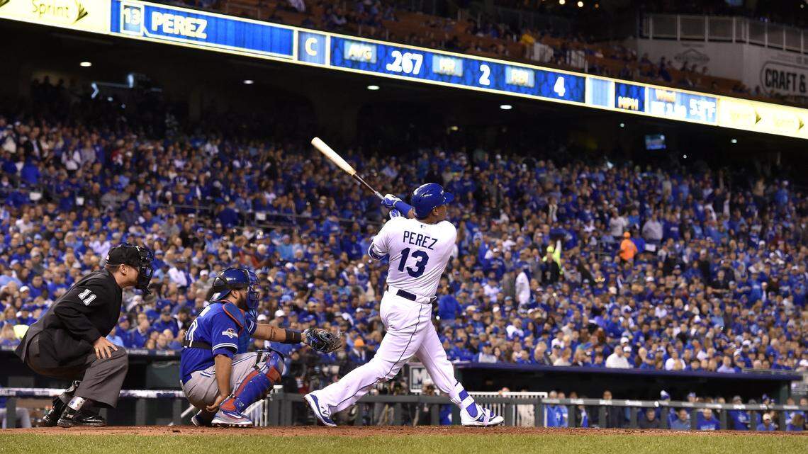 Kansas City Royals catcher Salvador Perez (13) connects for a solo homer in the fourth inning during Friday’s ALCS baseball game on October 16, 2015 at Kauffman Stadium in Kansas City, Mo.