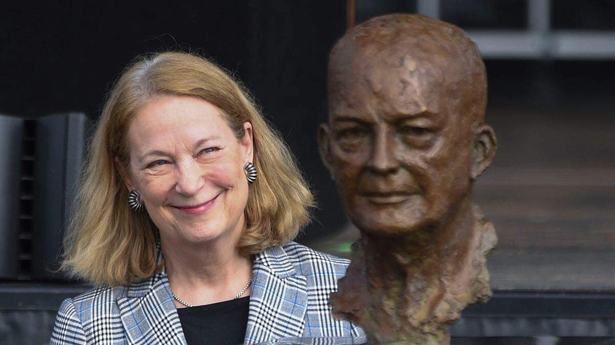 Susan Eisenhower, granddaughter of Dwight D. Eisenhower, looks at his new bust as it is unveiled during the ceremony renaming Fort Gordon on Oct. 27.