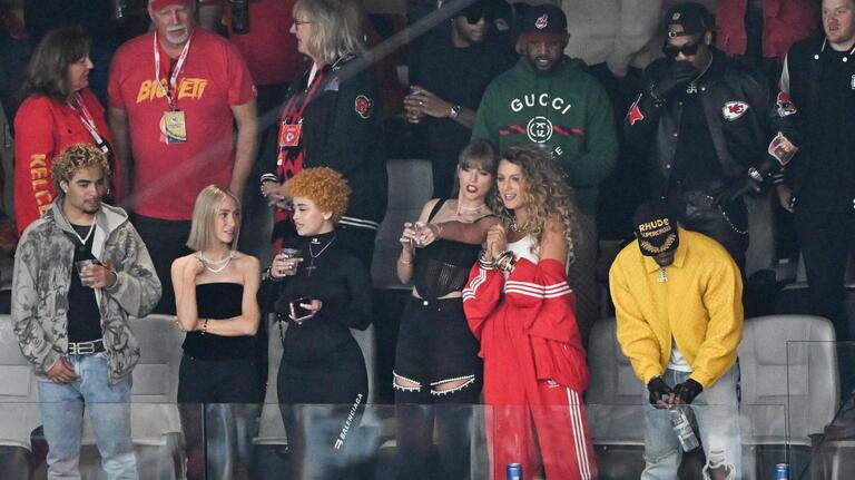 Scenes from Taylor Swift’s Super Bowl suite: Taylor’s beer chug, Jason Kelce’s big hug