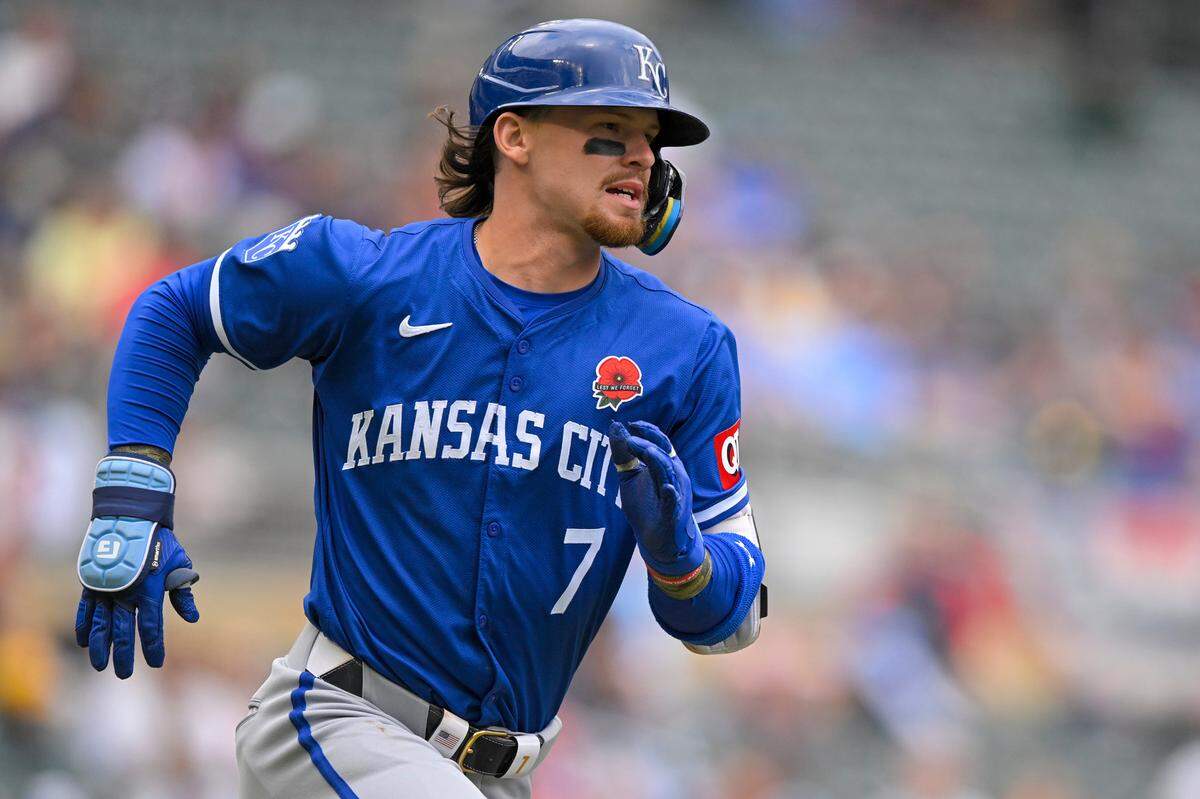 Kansas City Royals shortstop Bobby Witt Jr. heads to first on a single against the Minnesota Twins during Monday’s game at Target Field in Minneapolis.