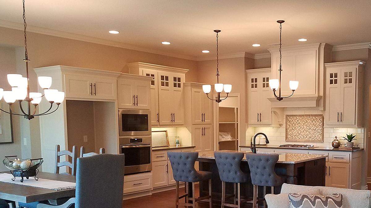 The living space flows into the well-appointed kitchen and dining areas for gracious living and entertaining in the Gatewood Villas Rockwood plan.