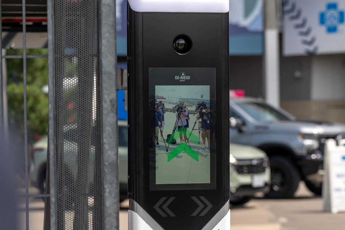 Go-Ahead Entry technology is seen outside of Kauffman Stadium during a press conference on Monday in Kansas City. It scans fans’ faces and confirms they match uploaded photos to admit them to games.