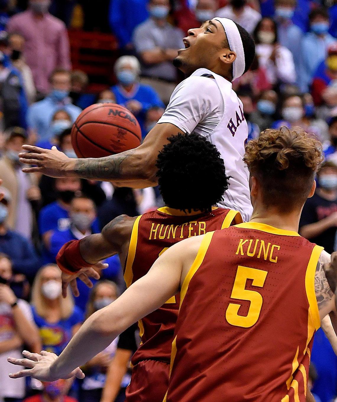 KU’s Dajuan Harris drove down the right side of the lane for the game-winning shot over Iowa State’s Tyrese Hunter in the closing seconds of Tuesday night’s game at Allen Fieldhouse. KU won 62-61.