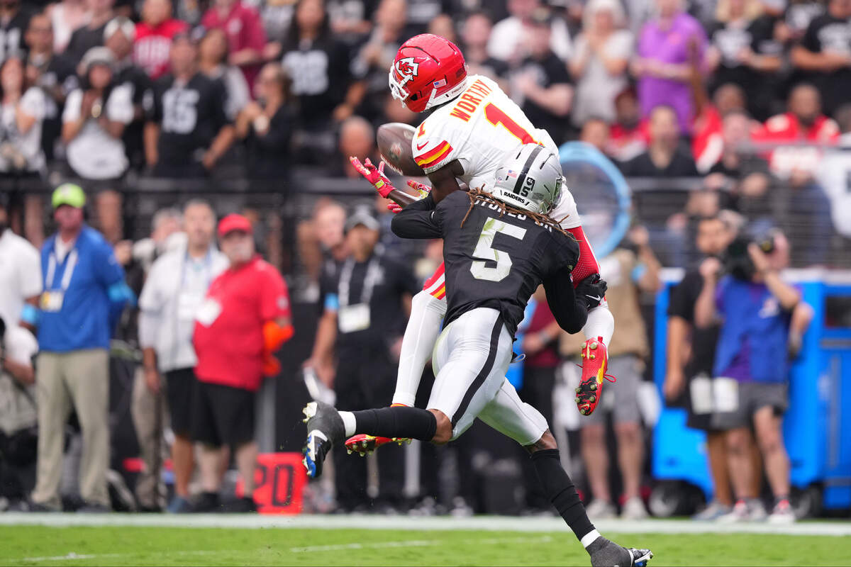 Kansas City Chiefs wide receiver Xavier Worthy (1) catches a pass against Las Vegas Raiders cornerback Eric Stokes (5) during a Week 4 NFL game at Allegiant Stadium in Paradise, Nev., Sunday, Oct. 4, 2026.