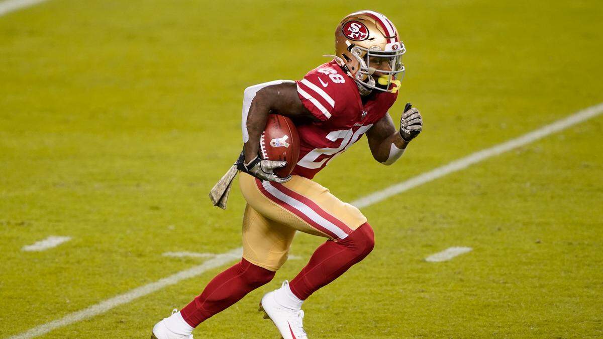 San Francisco 49ers running back Jerick McKinnon (28) runs against the Green Bay Packers during the first half of an NFL football game in Santa Clara, Calif., Thursday, Nov. 5, 2020. (AP Photo/Tony Avelar)
