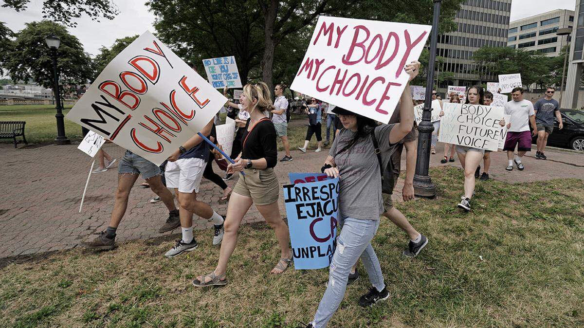 People rally in support of abortion rights, Saturday, July 2, 2022, in Kansas City, Missouri.