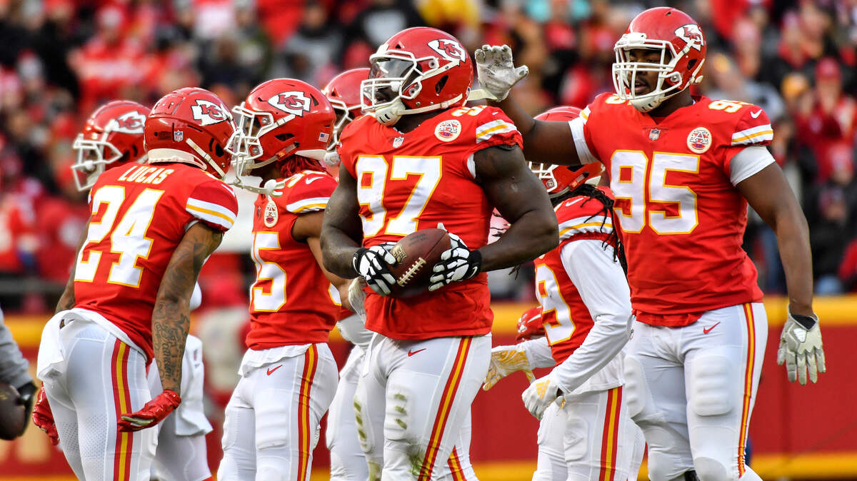 Kansas City Chiefs defensive end Allen Bailey, 97, is congratulated by defensive end Chris Jones after Bailey recovered an Oakland fumble in the first quarter during Sunday’s football game on December 30, 2018 at Arrowhead Stadium in Kansas City, Mo.