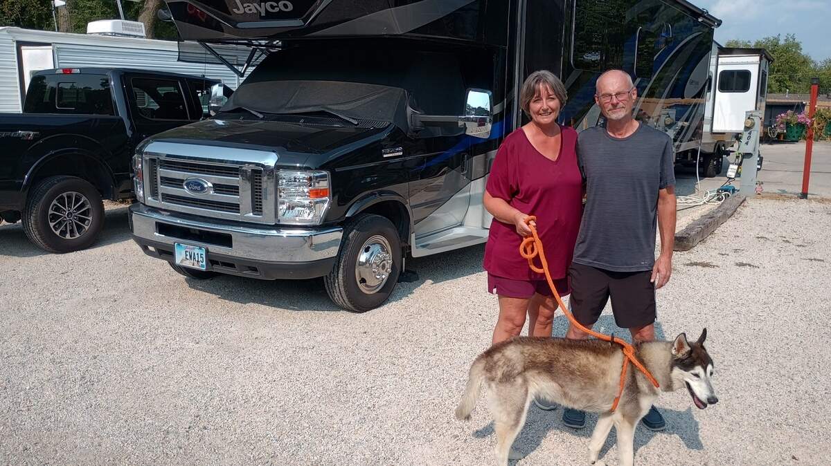 Tracy and Myra Archer, plus their son, Zachary, and their beloved husky, Shadow, roam the country in this rig that for three years has been their only home.