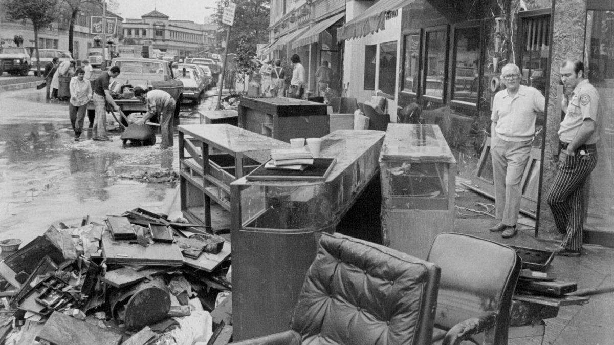 Merchants along Nichols Road assess the damage. THE KANSAS CITY STAR