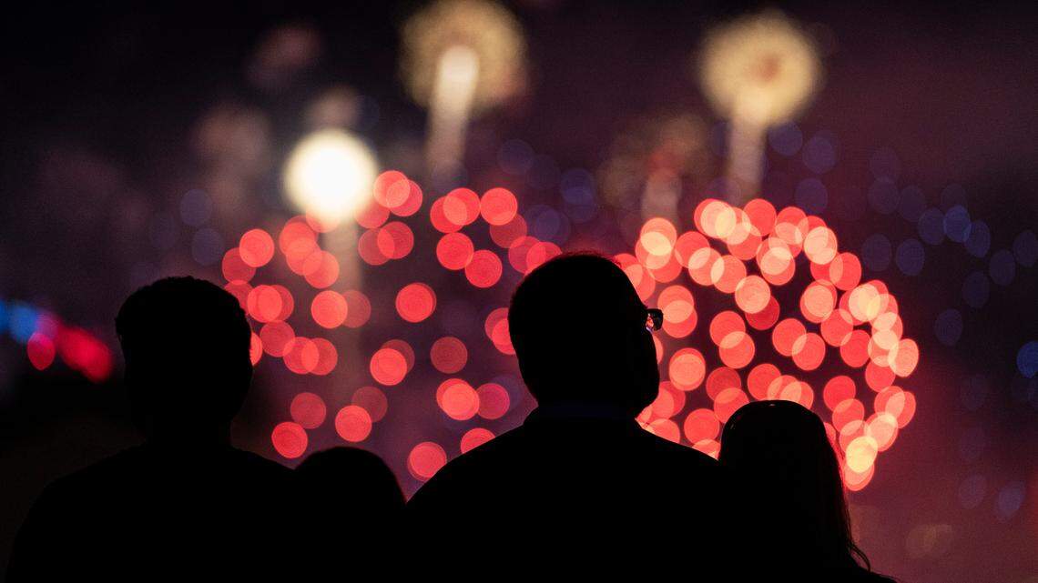 People watch as fireworks explode over the Las Vegas Strip during a July 4 display. In Indiana, a man died early Sunday when a fireworks mortar exploded next to him, fatally wounding him, officials say.