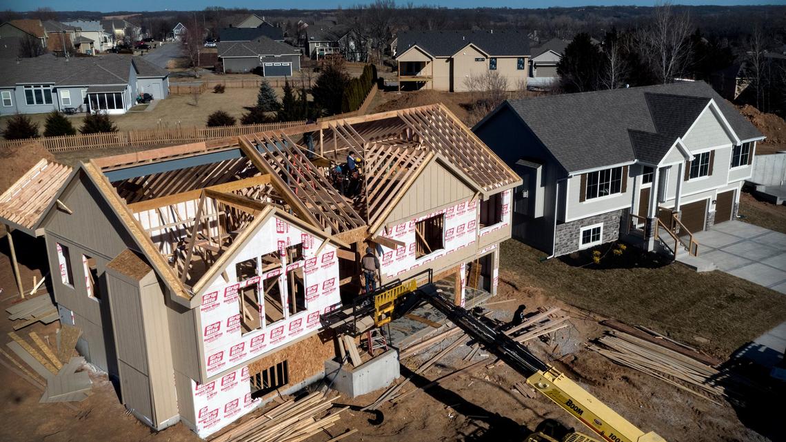 In this March file photo, homes in the $300,000 range are under construction in De Soto’s Cherokee Woods subdivision.