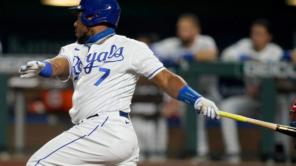 Kansas City Royals Maikel Franco hits a two-run single during the sixth inning of a baseball game against the St. Louis Cardinals at Kauffman Stadium in Kansas City, Mo., Monday, Sept. 21, 2020. (AP Photo/Orlin Wagner)