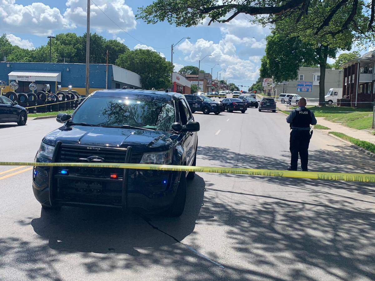 Kansas City police respond to a shooting at the 3500 block of Independence Ave., the first in a string of shootings Tuesday that police believe are unrelated