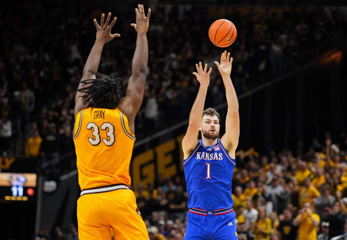 Kansas Jayhawks center Hunter Dickinson (1) shoots the ball against Missouri Tigers center Josh Gray (33) during the first half at Mizzou Arena on Dec. 8, 2024.