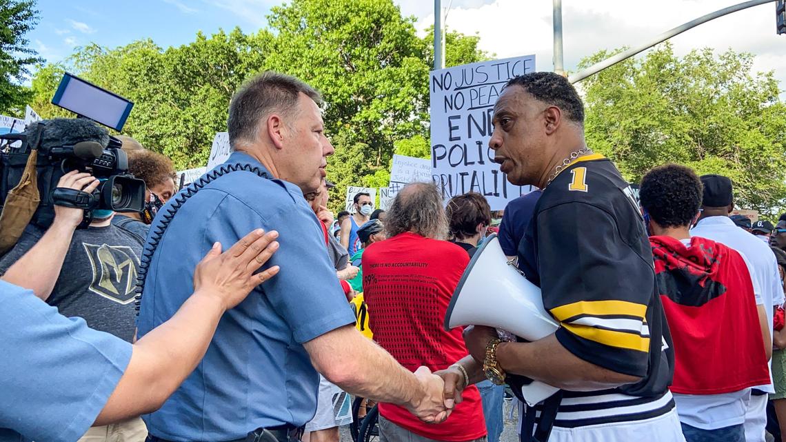 Kansas City police advertised a unity march from Warwick Avenue and Emanuel Cleaver II Boulevard at Southmoreland Park to the Country Club Plaza that included city officials, pastors, churches and community leaders Wednesday, June 3, 2020. Kansas City police chief Rick Smith, left, greeted a speaker. Shortly after, Smith announced that funding had been found for body cameras. For the sixth night, protesters came out to the Country Club Plaza to protest police brutality and the death of George Floyd.