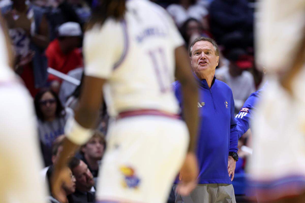 Head coach Bill Self of the Kansas Jayhawks speaks to his team during the first half against the St. John's Red Storm in the second round of the 2026 NCAA Men's Basketball Tournament at Viejas Arena on March 22, 2026 in San Diego.